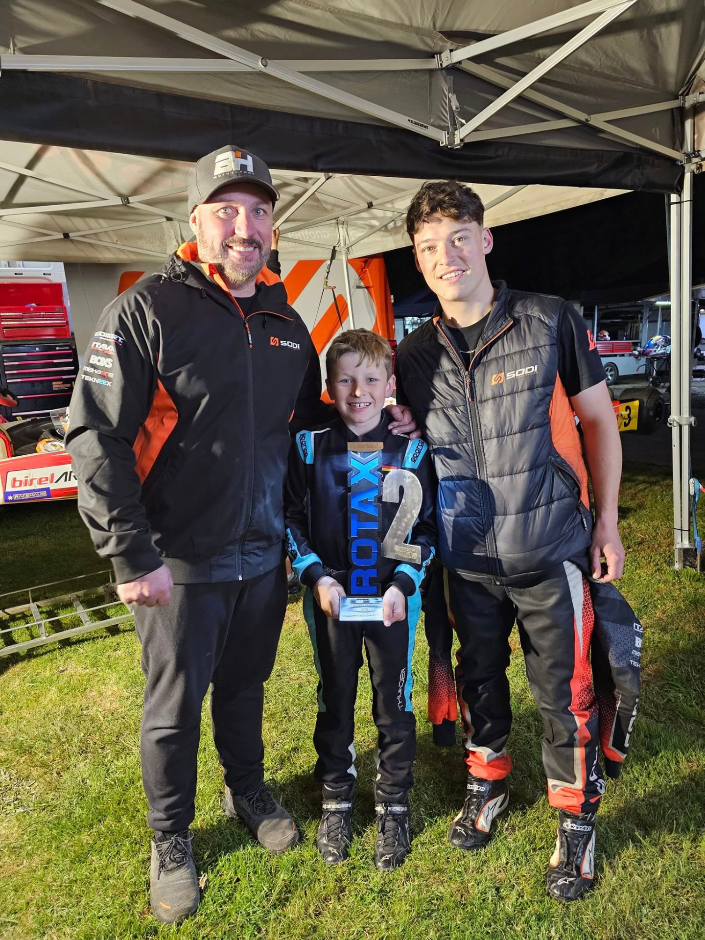 Niko with his dad and brother Brad after a Rotax round